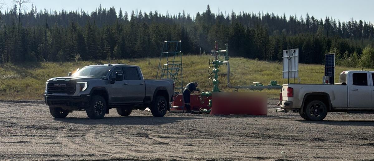 LynxLift truck on a well pad while a wellhead is being worked on