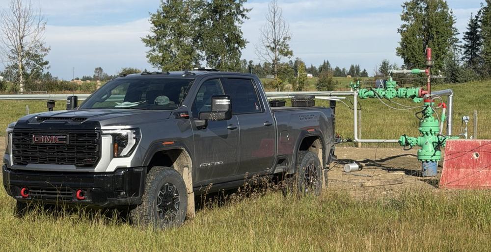 LynxLift truck parked beside a gas wellhead